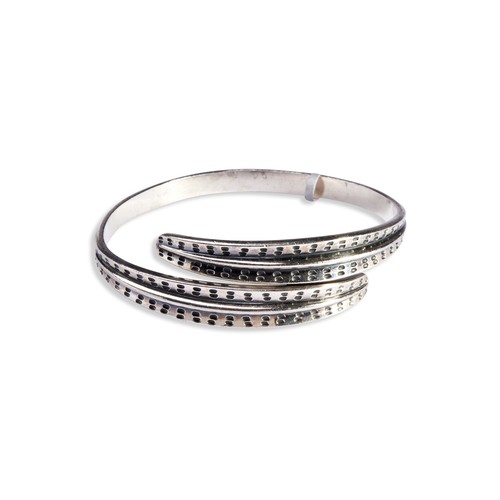 166 - A SILVER BANGLE, SAGA RANGE BY DAVID ANDERSEN of torque design with oval stamped decoration to the u... 