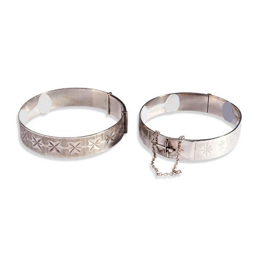 169 - TWO BANGLES BY GEORG JENSEN A bangle of expandable form with engraved floral decorationHallmarked ‘G... 