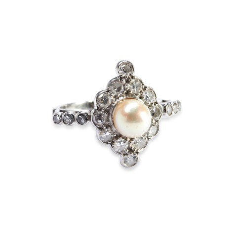 145 - A PEARL AND DIAMOND RING  The natural pearl set within a cluster of ten diamonds with two diamond ab... 