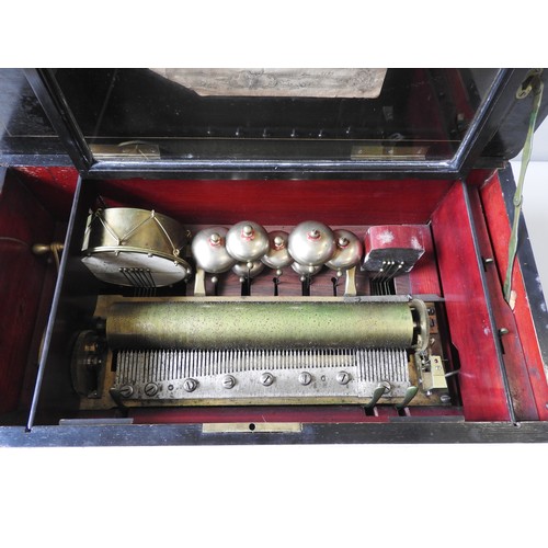 307 - A TAMBOUR, TIMBRES AND CASTAGNETTES MUSICAL BOXPLAYING TEN AIRS accompanied by drum, seven engine-tu... 