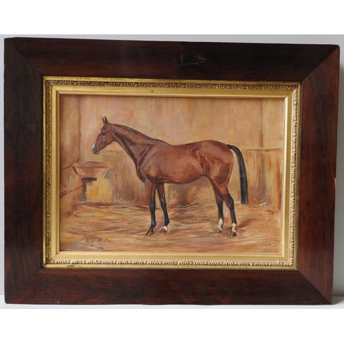 226 - MAY BURTON, BAY HORSE IN A STABLE, oil on canvas, signed and dated, 1934, in an earlier rosewood fra... 