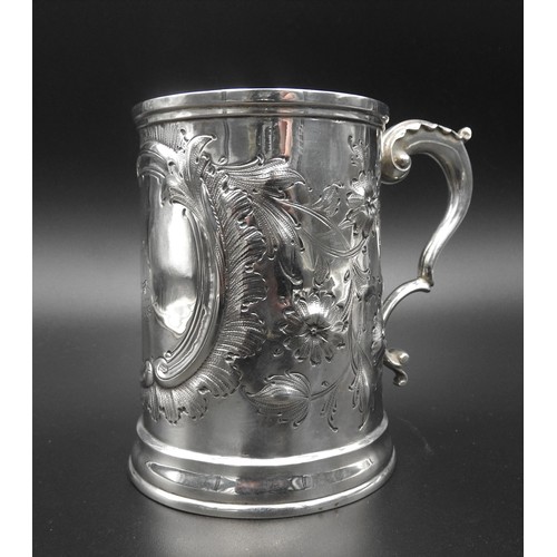 448 - A VICTORIAN SILVER TANKARD WITH FLORAL REPOUSSE DECORATION, by William Brown & William Nathaniel... 