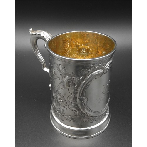 448 - A VICTORIAN SILVER TANKARD WITH FLORAL REPOUSSE DECORATION, by William Brown & William Nathaniel... 