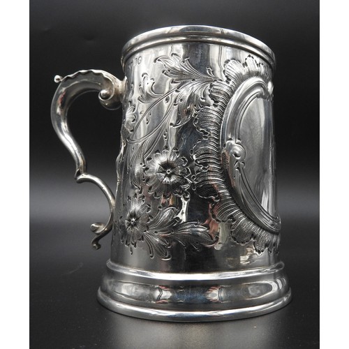 448 - A VICTORIAN SILVER TANKARD WITH FLORAL REPOUSSE DECORATION, by William Brown & William Nathaniel... 