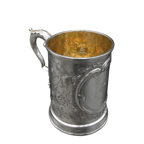 448 - A VICTORIAN SILVER TANKARD WITH FLORAL REPOUSSE DECORATION, by William Brown & William Nathaniel... 