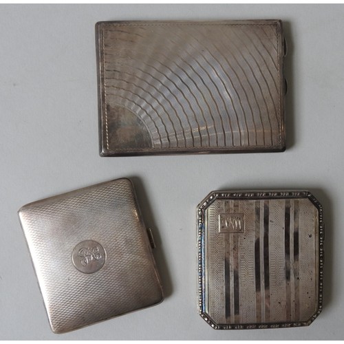 454 - THREE VINTAGE SILVER CARD CASES, from the 1920's and 1930's, with machine turned decoration, the lar... 