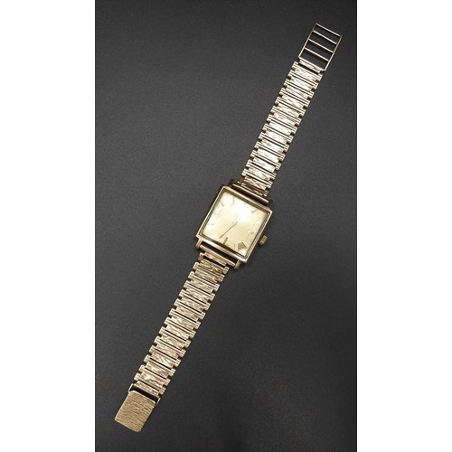 487 - A VINTAGE ZENITH AUTOMATIC 9CT GOLD WRIST WATCH, circa 1968, the square face with date window in bot... 