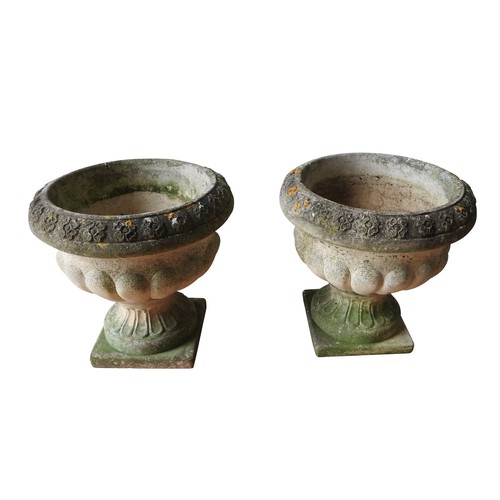 149 - A PAIR OF WEATHERED 'SANDFORD STONE' RECONSTITUTED PLANTERS ON PEDESTALS, with a fluted pattern, 38 ... 