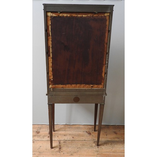 54 - A PAINTED GLAZED SHERATON STYLE CABINET ON STAND WITH NEW YORK MAKER'S LABEL, the label reads 'C.G M... 