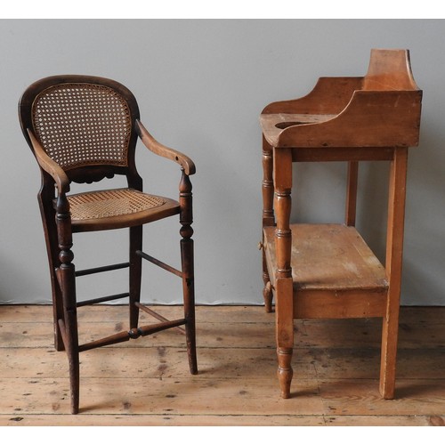 63 - A VICTORIAN PINE WASH STAND AND A CHILD'S CANE SEAT HIGH CHAIR