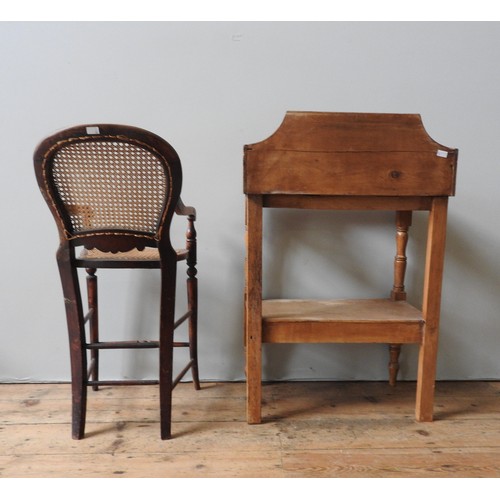 63 - A VICTORIAN PINE WASH STAND AND A CHILD'S CANE SEAT HIGH CHAIR