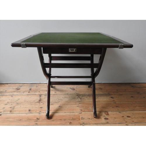 69 - A FOLDING CAMPAIGN-STYLE CARD TABLE, with baize lined top and frieze drawer, and London label