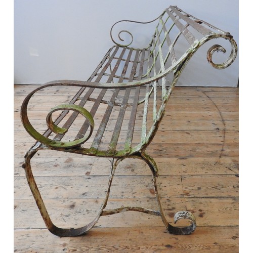 151 - A 19TH CENTURY WROUGHT-IRON GARDEN BENCH, with swept scroll work arms, 80 x 183 x 58 cmProvenance : ... 