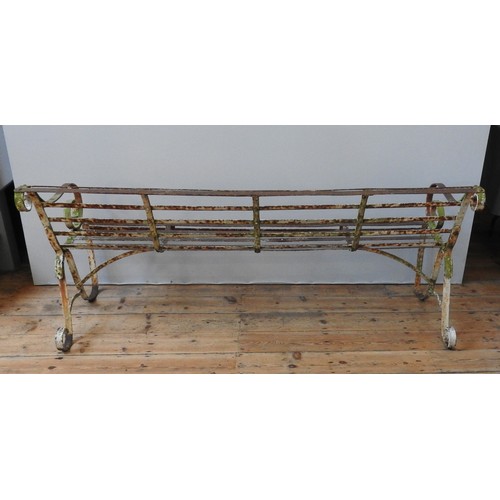 151 - A 19TH CENTURY WROUGHT-IRON GARDEN BENCH, with swept scroll work arms, 80 x 183 x 58 cmProvenance : ... 