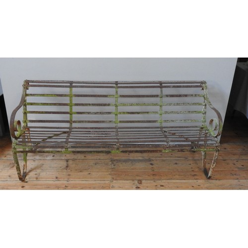 151 - A 19TH CENTURY WROUGHT-IRON GARDEN BENCH, with swept scroll work arms, 80 x 183 x 58 cmProvenance : ... 