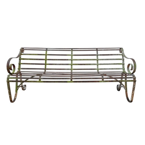 A 19TH CENTURY WROUGHT-IRON GARDEN BENCH, with swept scroll work arms, 80 x 183 x 58 cm