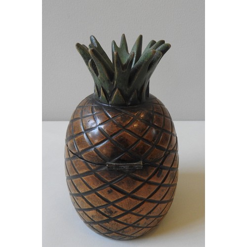 304 - A 20TH CENTURY TREEN TEA CADDY, in the form of a pineapple, 20 cm high