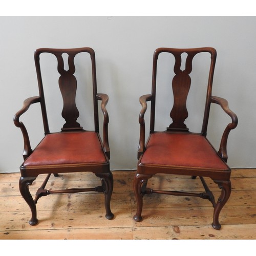 81 - A PAIR OF EARLY 20TH CENTURY MAHOGANY ELBOW CHAIRS, with pierced shaped splats and cabriole legs, un... 