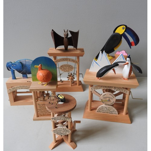 317 - SIX 'EVOLUTIONARY BLUNDERS' AUTOMATA BY NEIL HARDY, depicting Toucan, Penguins, Bat and other animal... 