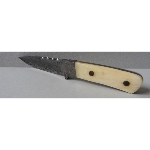 298 - A 'MAAN' FIXED BLADE BONE HANDLE KNIFE, the 4 inch blade made with Damascus steel,  in a leather she... 