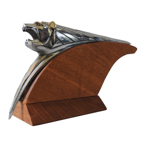 326 - A PEUGEOT 203 HOOD ORNAMENT, circa 1950, on a custom made plinth, 14 cm high, 27 cm long