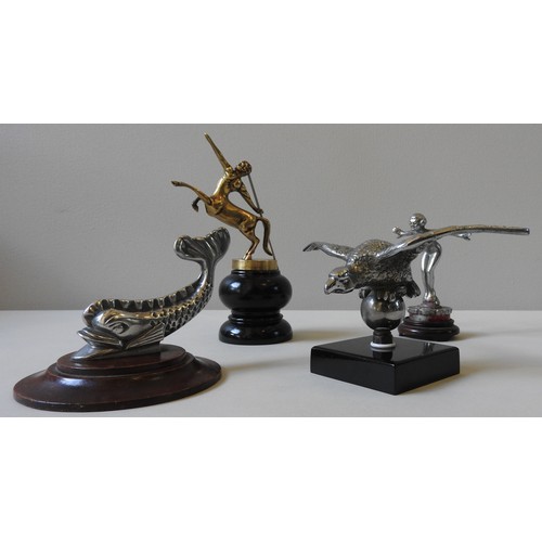 329 - FOUR ASSORTED REPLICA HOOD ORNAMENTS, depicting fish, centaur, eagle and nude, all mounted on wooden... 