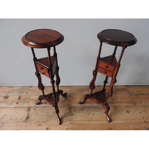 92 - A PAIR OF GEORGE III STYLE MAHOGANY 'WASH STANDS', or plant stands, with barley twist decoration, tw... 