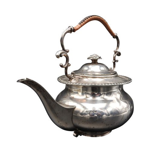 469 - A SILVER SPIRIT KETTLE, with ornate scroll foliate handle, lacking it's stand,  Sheffield 1913, make... 