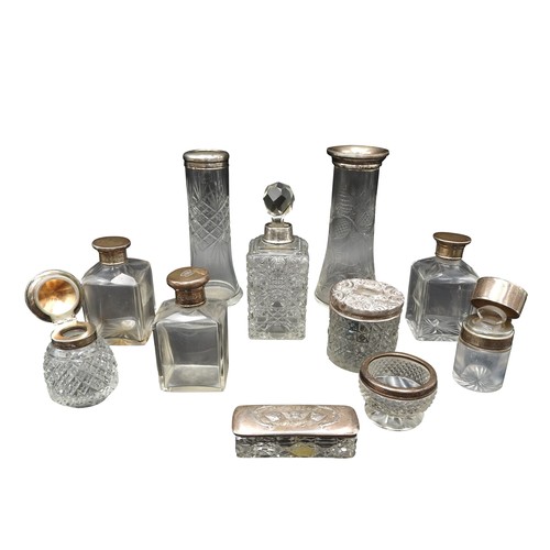 470 - ELEVEN ASSORTED SILVER MOUNTED GLASS SCENT BOTTLES, VASES AND INK WELLS, the tallest vase standing 1... 