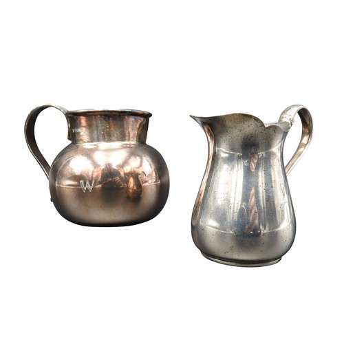 471 - A SILVER MILK JUG AND SILVER CREAM JUG, the larger milk jug of compressed globular form with reeded ... 