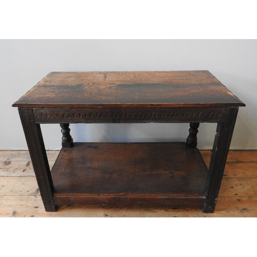 96 - A 17TH CENTURY TWO TIER TABLE, rare form, with later shelf boards, 71 x 105 x 54 cm