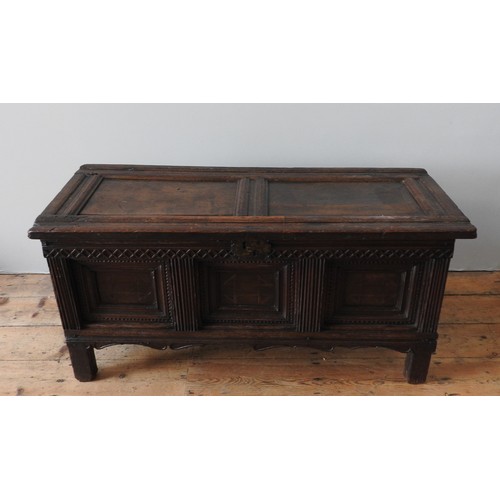 97 - A LATE 16TH CENTURY ELIZABETHAN OAK CARVED AND INLAID CHEST, circa 1590-1600