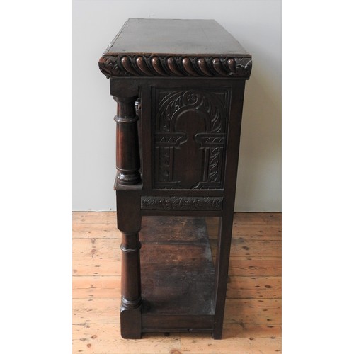 101 - A 17TH CENTURY OAK AND WALNUT LIVERY CUPBOARD, circa 1620, 123 x 113 x 49 cm