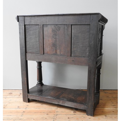 101 - A 17TH CENTURY OAK AND WALNUT LIVERY CUPBOARD, circa 1620, 123 x 113 x 49 cm