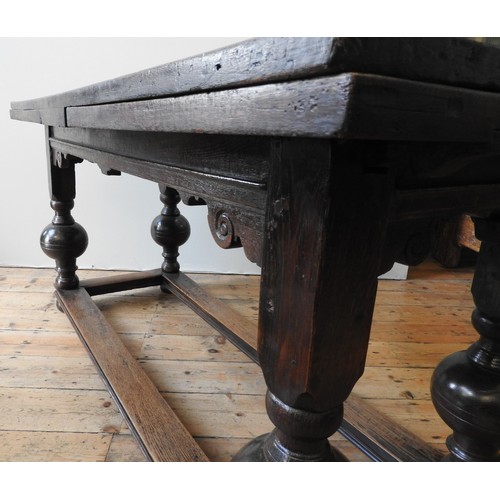 102 - AN EARLY 17TH CENTURY DUTCH OAK DRAW-LEAF TABLE, circa 1630 and later, 81 x 163 x 75 cm