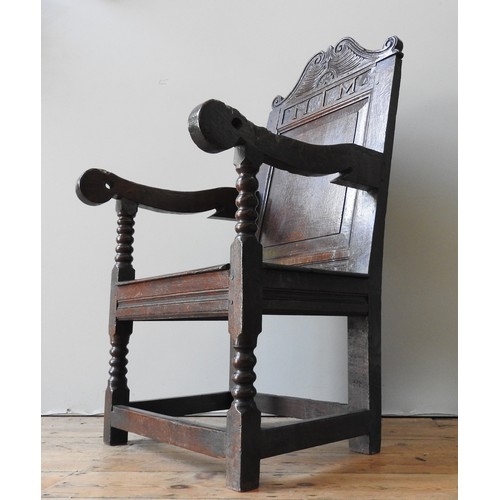 103 - A 17TH CENTURY OAK ARMCHAIRProvenance: From Trellisk House, Cornwall