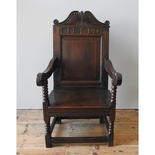 103 - A 17TH CENTURY OAK ARMCHAIRProvenance: From Trellisk House, Cornwall