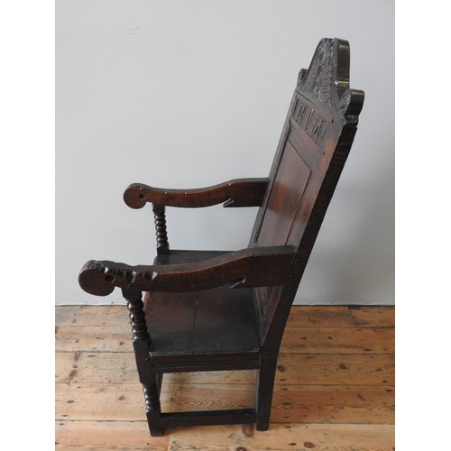 103 - A 17TH CENTURY OAK ARMCHAIRProvenance: From Trellisk House, Cornwall