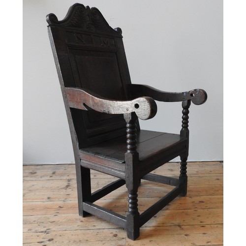 103 - A 17TH CENTURY OAK ARMCHAIRProvenance: From Trellisk House, Cornwall