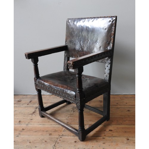 116 - A LARGE CHARLES I LEATHER COVERED OAK ARMCHAIR