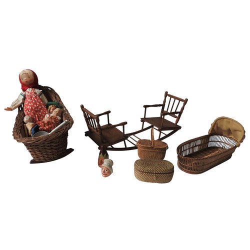 318 - A TURNED WOODEN DOUBLE DOLLS ROCKER, early 20th century, a whicker doll's crib, another whicker crib... 