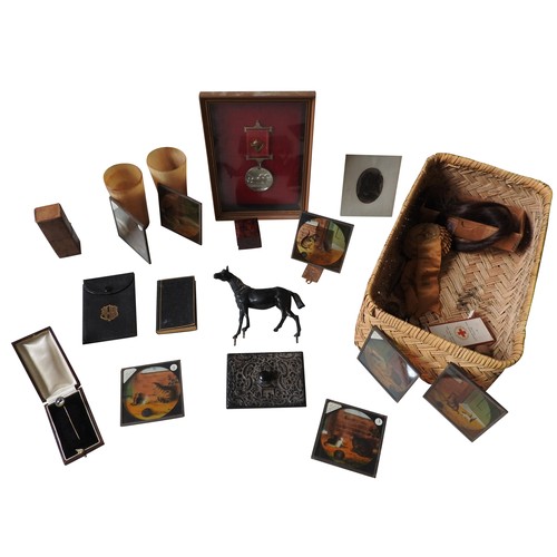 290 - A FRAMED EQUESTRIAN 'SHOW' MEDAL, a WWI Red Cross Medal, two horn beakers, a patent door wedge and v... 