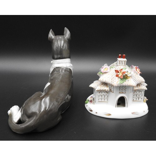 437 - A CONTINENTAL PORCELAIN 'BOX' IN THE FORM OF A RECUMBENT DOG WITH A REMOVABLE HEAD (toe chipped) and... 