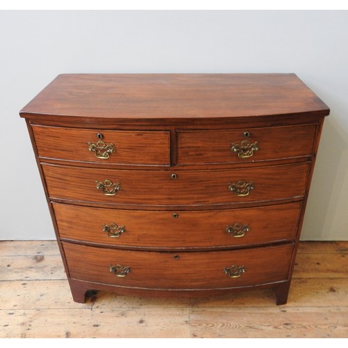 138 - A GEORGE III MAHOGANY BOW FRONT CHEST OF FIVE DRAWERS, comprising of two short drawers over three lo... 