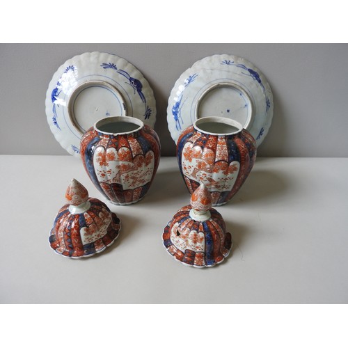 440 - A PAIR OF 19TH CENTURY IMARI COVERED VASES AND TWO DISHES, the lobed baluster vases with lids, 32 cm... 