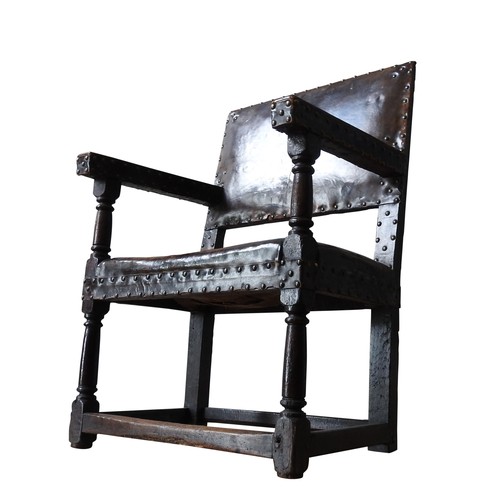 116 - A LARGE CHARLES I LEATHER COVERED OAK ARMCHAIR