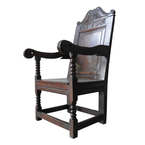 103 - A 17TH CENTURY OAK ARMCHAIRProvenance: From Trellisk House, Cornwall