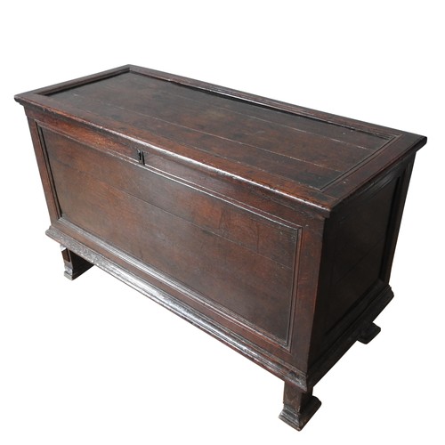 137 - VERY RARE LATE ELIZABETHAN OAK CHEST WITH ITS ORIGINAL MOULDED FEET, although plain a rare early pie... 