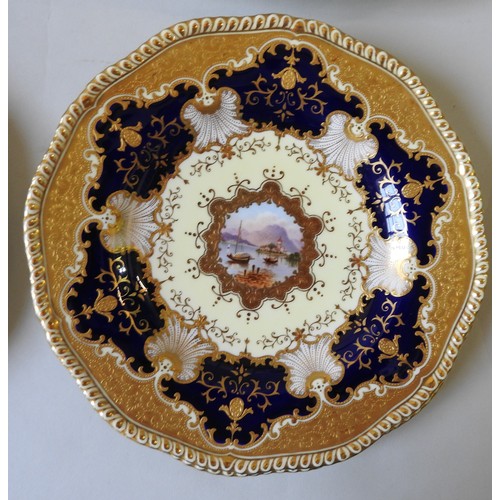 554 - A LATE 19TH CENTURY COALPORT DESSERT SERVICE, profuse gilt decoration and cobalt glaze on a pale lem... 