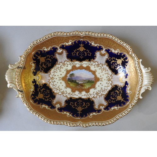 554 - A LATE 19TH CENTURY COALPORT DESSERT SERVICE, profuse gilt decoration and cobalt glaze on a pale lem... 